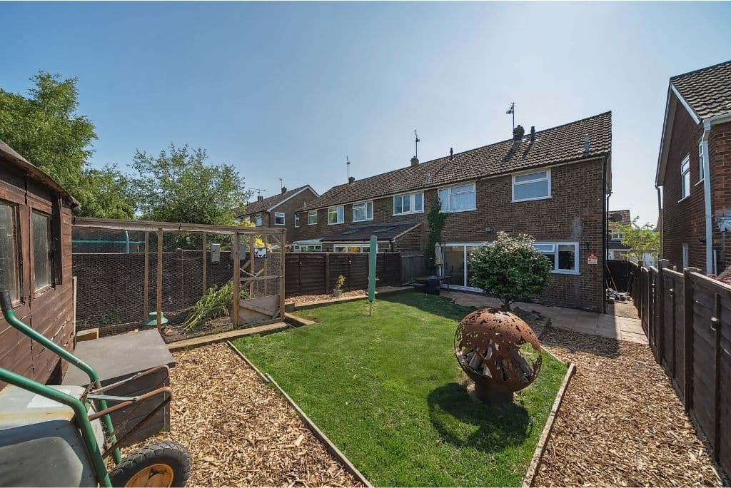 Charming village home with generous garden, garage en bloc, and peaceful riverside setting