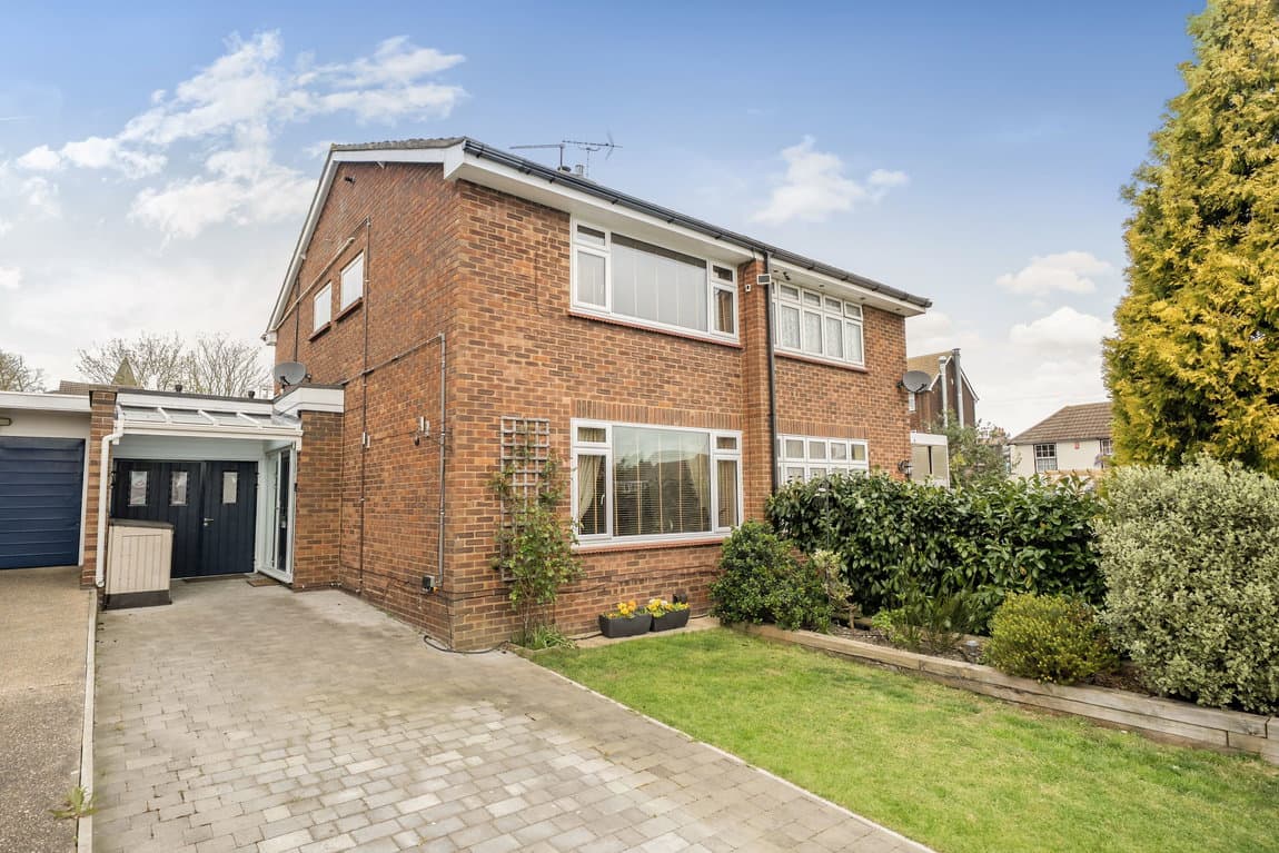 Extended village home offering 1,229 sq ft of family space