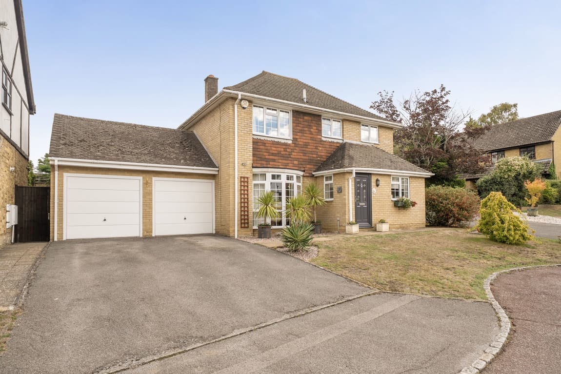 Four bedrooms, double garage, and stunning walled garden
