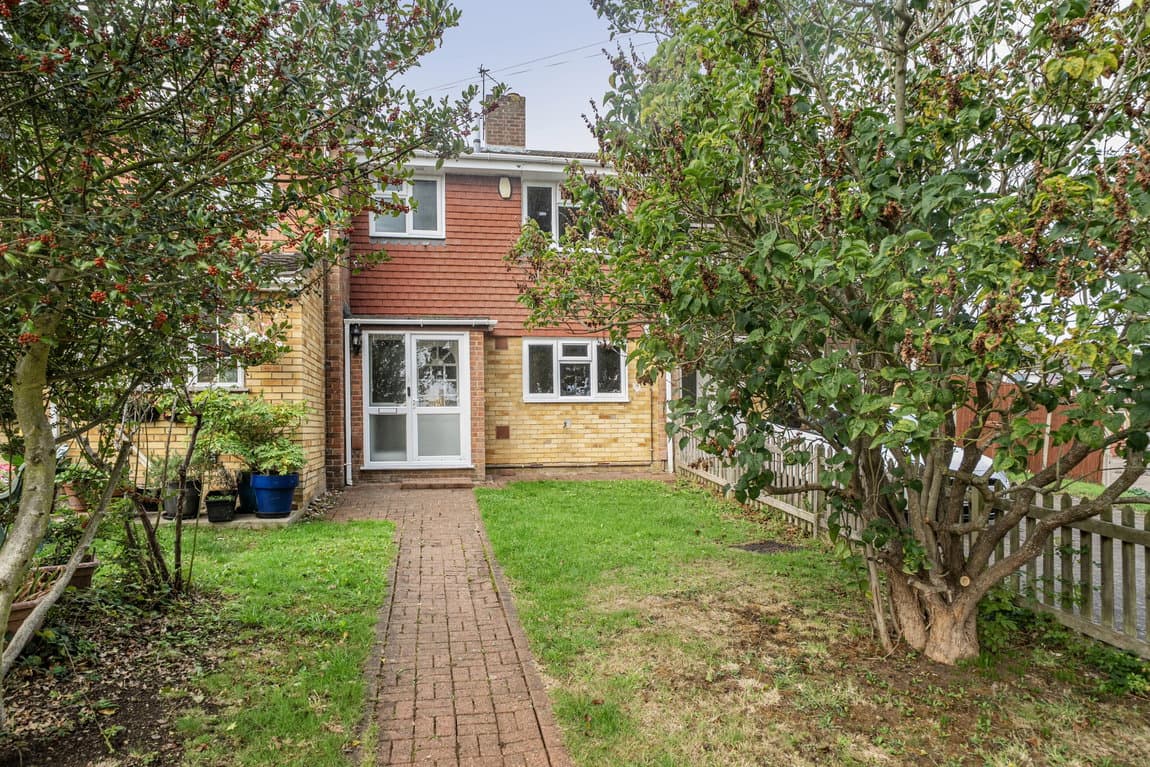 CHAIN FREE WITH THREE BEDROOMS, A GARAGE AND HUGE POTENTIAL!